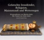 Gefatschte Jesuskinder, Reliquien, Maienstrauß und Wettersegen