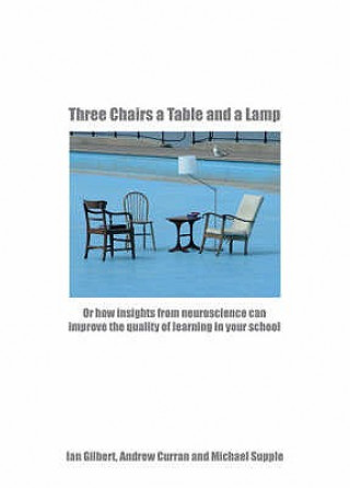 Three Chairs a Table and a Lamp