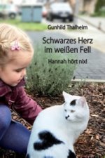 Schwarzes Herz im weißen Fell