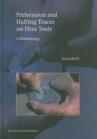 Prehension and Hafting Traces on Flint Tools