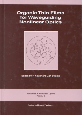 Organic Thin Films for Waveguiding Nonlinear Optics