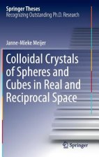 Colloidal Crystals of Spheres and Cubes in Real and Reciprocal Space