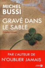 Grave dans le sable