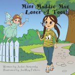 Miss Maddie Mae Loses a Tooth
