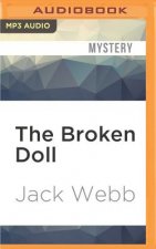 The Broken Doll