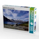 Aufgestapelte Varden vor einem Fjord (Puzzle)
