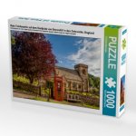 Rote Telefonzelle auf dem Dorfplatz von Snowshill in den Cotswolds, England (Puzzle)