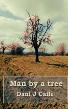 Man by a tree