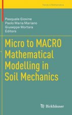 Micro to MACRO Mathematical Modelling in Soil Mechanics