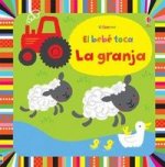 El bebé toca la granja