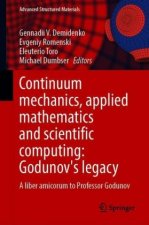 Continuum Mechanics, Applied Mathematics and Scientific Computing:  Godunov's Legacy