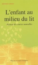 L'enfant au milieu du lit