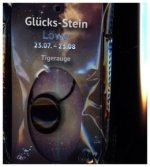 Glücksstein mit Band auf Astrokarte Löwe/Tigerauge