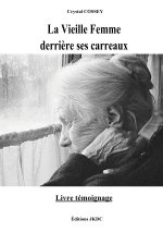LA VIEILLE FEMME DERRIERE SES CARREAUX