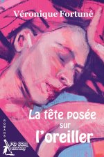 La t?te posée sur l'oreiller