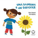 bambina e un girasole